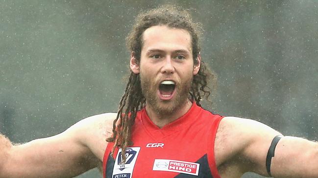 MELBOURNE, AUSTRALIA - JUNE 23:  Jack Hutchins of Casey celebrates a goal during the round 12 VFL match between Casey and Coburg at Casey Fields on June 23, 2018 in Melbourne, Australia.  (Photo by Robert Prezioso/AFL Media/Getty Images)