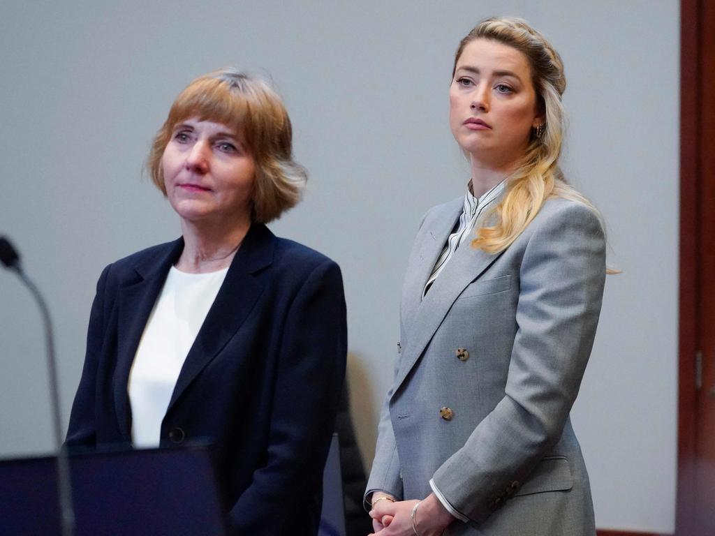 Actor Amber Heard stands with her lawyer Elaine Bredehoft in court on May 27, 2022. Picture: Steve Helber / AFP.