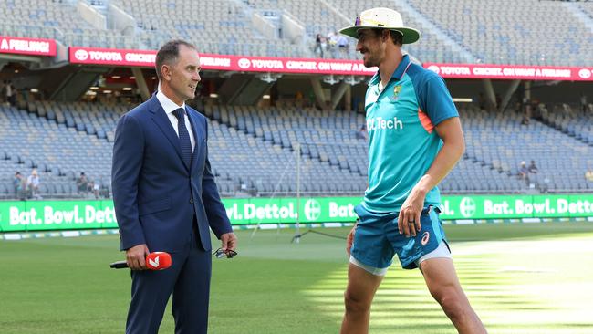 Langer with Mitchell Starc.