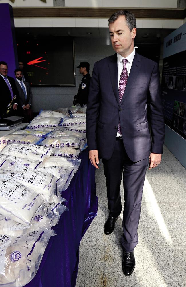 Michael Keenan in China, alongside a large quantity of seized illegal drugs. Picture Gary Ramage