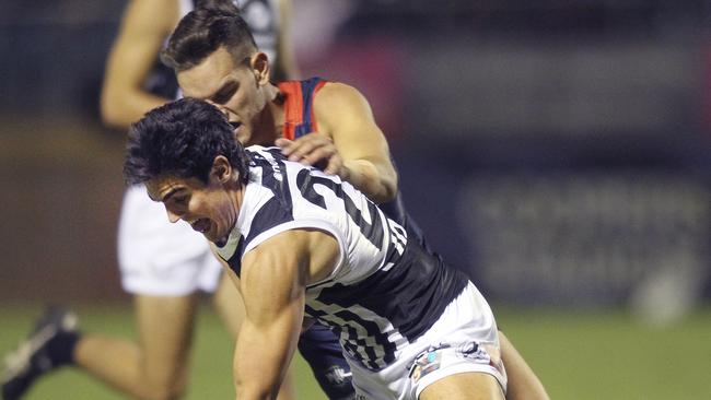 Port’s Joel Garner tries to clear the ball during the Magpies clash with Norwood at The Parade in April 2019. Picture Dean Martin