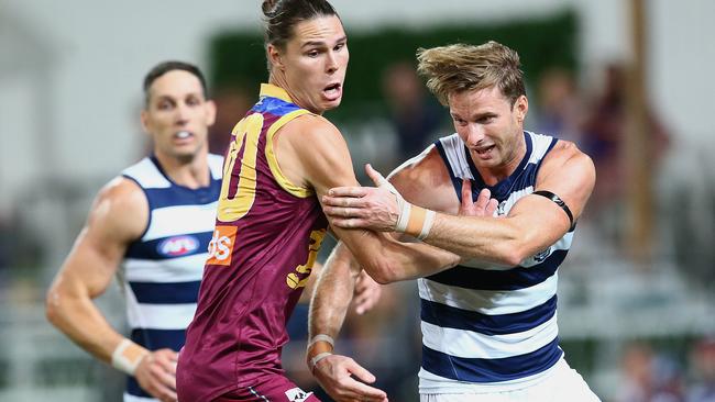 Brisbane’s Eric Hipwood and Lachie Henderson compete for the ball in the preliminary final. Picture: Jono Searle/AFL Photos