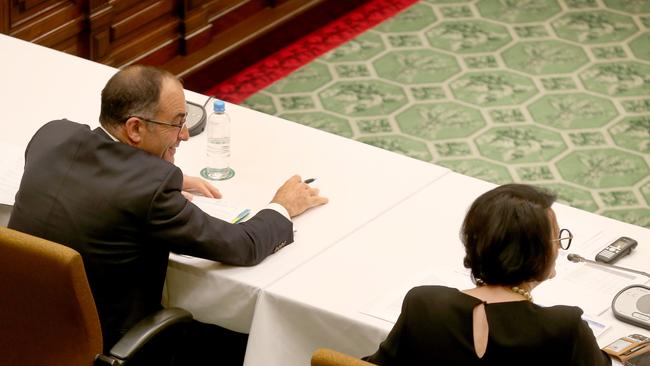 Chief Justice Chris Kourakis, left, sitting alongside Attorney-General Vickie Chapman as he is questioned about the court sheriff's officers report. Picture: Dean Martin