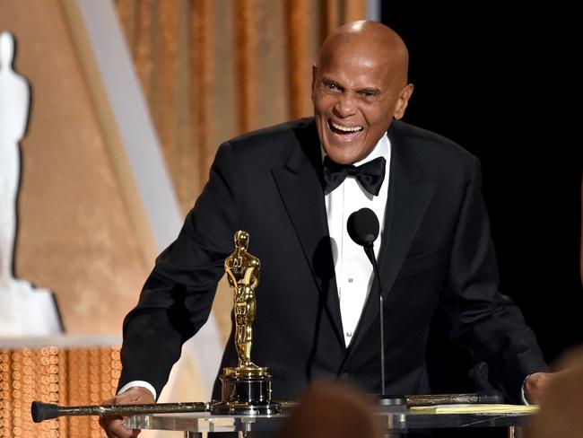 Belafonte accepting the Jean Hersholt Humanitarian Award onstage during the 2014 Oscars. Picture: Getty Images