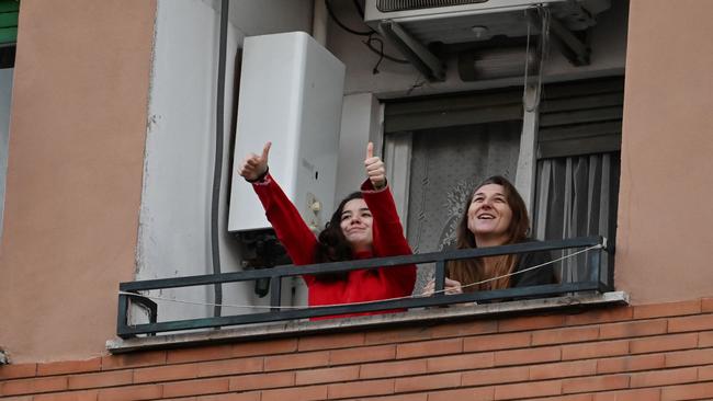 People in isolation in Italy stay positive. Picture: Andreas Solaro / AFP