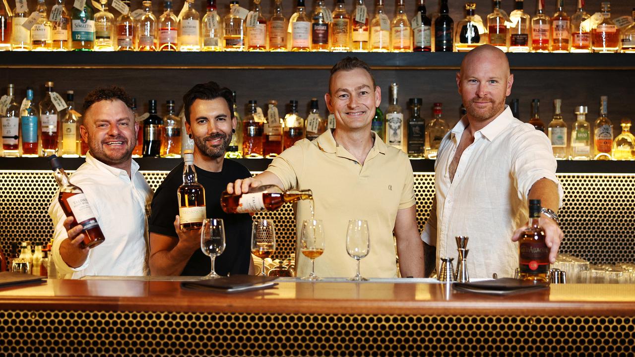 Cairns' first small bar, 3 Wolves, has relocated to a bigger venue at 13A Spence Street in the Cairns CBD. 3 Wolves co owners Sam Kennis, Andrew Pare, Darren Barber and Grant Buckham now have twice as much bar space, greatly expanding their ranges of whiskys available at the new venue. Picture: Brendan Radke