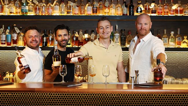 Cairns' first small bar, 3 Wolves, has relocated to a bigger venue at 13A Spence Street in the Cairns CBD. 3 Wolves co owners Sam Kennis, Andrew Pare, Darren Barber and Grant Buckham now have twice as much bar space, greatly expanding their ranges of whiskys available at the new venue. Picture: Brendan Radke