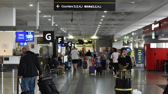 Passengers are seen in the International departures lounge at Melbourne Airport. Picture: AAP / James Ross.