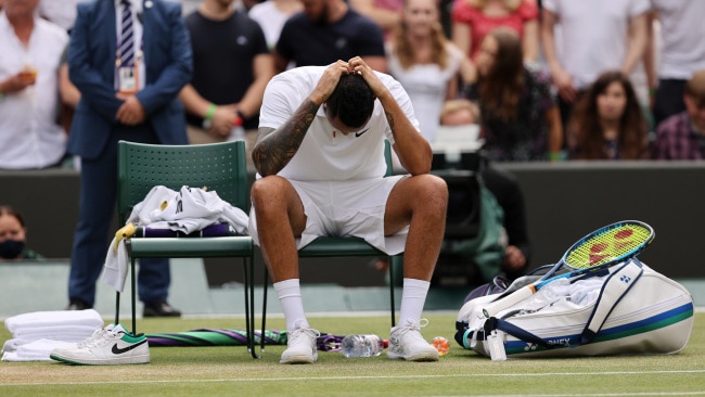 Kyrgios reacts after retiring injured during his men's singles third round match against Felix Auger Aliassime of Canada on Saturday July 3 in London. Photo: Clive Brunskill/Getty Images