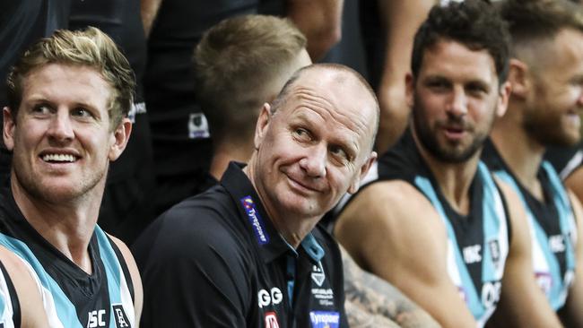 AFL - Port Adelaide Photo Day at Alberton Oval. Tom Jonas and Ken Hinkley looking around while waiting for the official team photo to be taken Picture SARAH REED