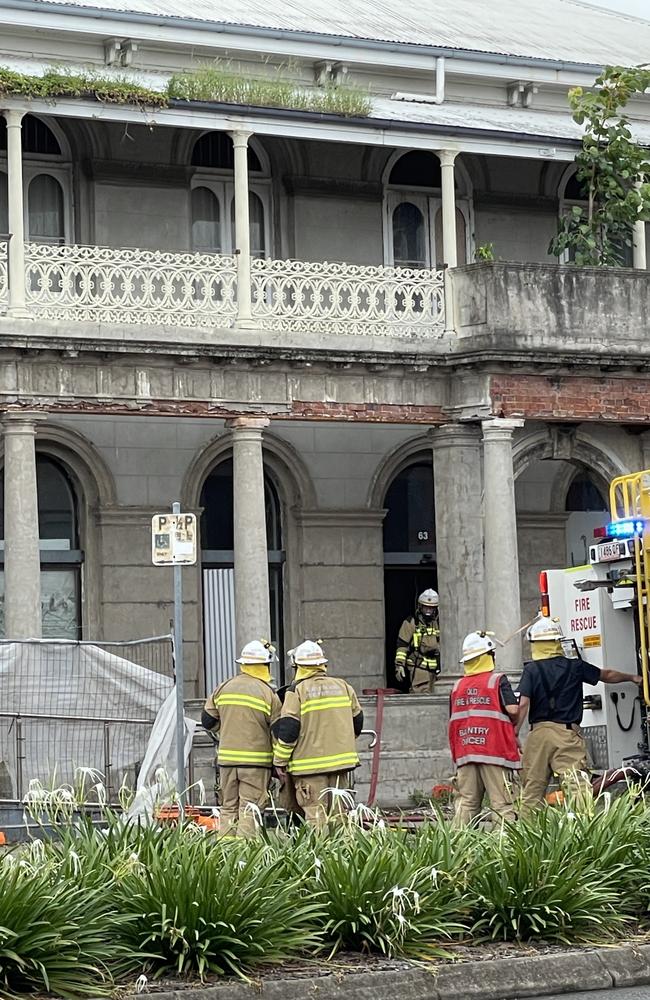 Firefighters at the historic Commonwealth Bank building on Victoria St, Mackay battling a blaze at 9:40am, March 24, 2024. Picture: Fergus Gregg