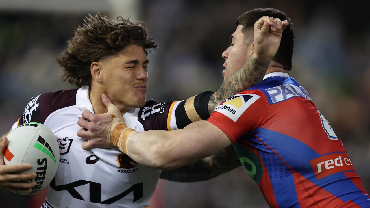 NEWCASTLE, AUSTRALIA - JULY 20: Reece Walsh of the Broncos is tackled by Bradman Best of the Knights during the round 20 NRL match between Newcastle Knights and Brisbane Broncos at McDonald Jones Stadium, on July 20, 2024, in Newcastle, Australia. (Photo by Scott Gardiner/Getty Images)