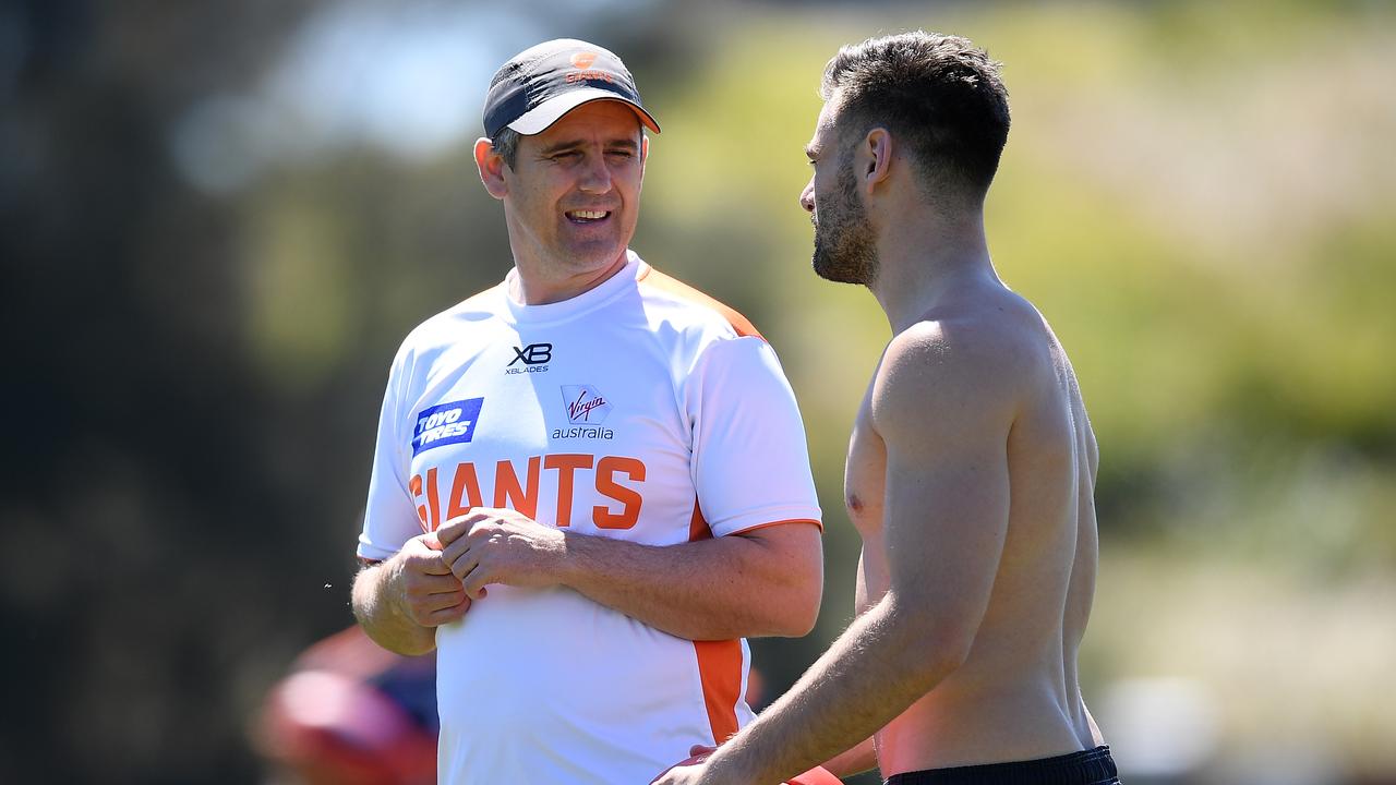 Giants coach Leon Cameron speaks with Stephen Coniglio on Tuesday.