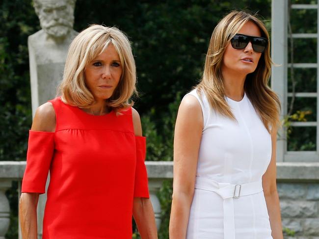 French President's wife Brigitte Macron and US First Lady Melania Trump arrive to attend a traditional dance performace with the other G7 leaders' spouses. Picture: AFP