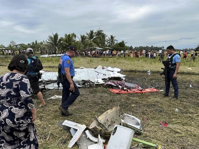 Officials say a US military-contracted plane crashed in a rice field in the southern Philippine. Picture: Sam Mala/UGC via AP