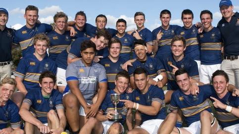 The champion 2014 Churchie team which won GPS schools rugbyundefeated. Kalyn Ponga (2nd from right), Mack Mason (holding trophy),Jaydn Su’A (to his right).