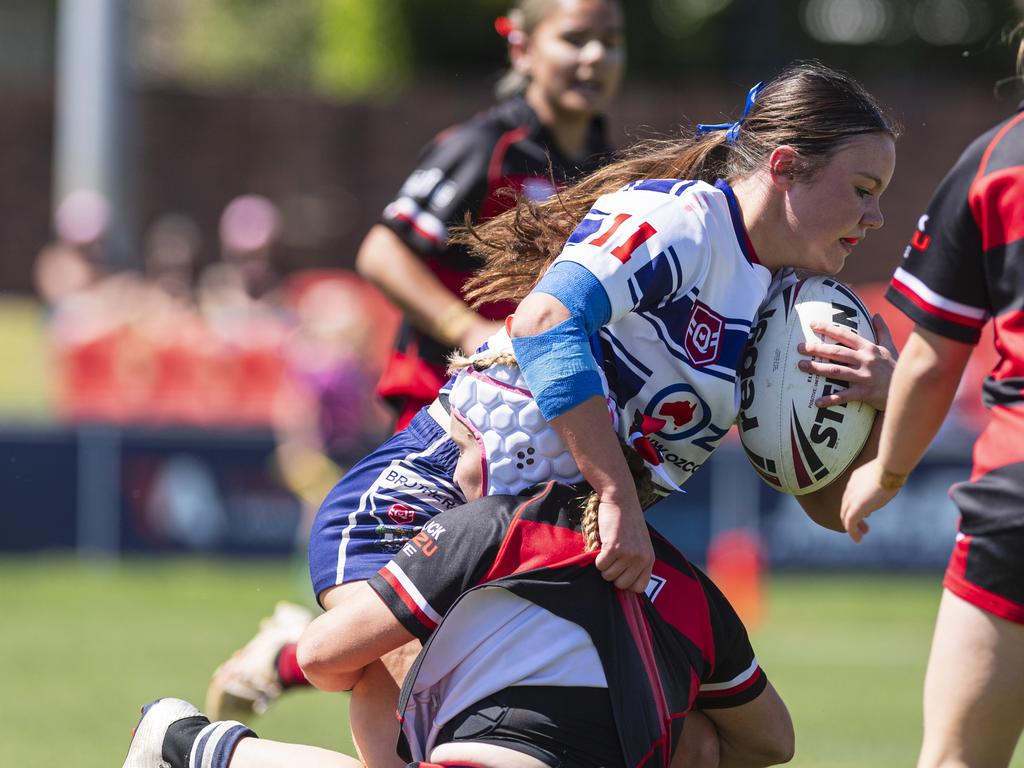 Ava Kelly of Brothers is tackled by Alara Williams of Valleys in U15 girls Toowoomba Junior Rugby League grand final at Toowoomba Sports Ground, Saturday, September 7, 2024. Picture: Kevin Farmer