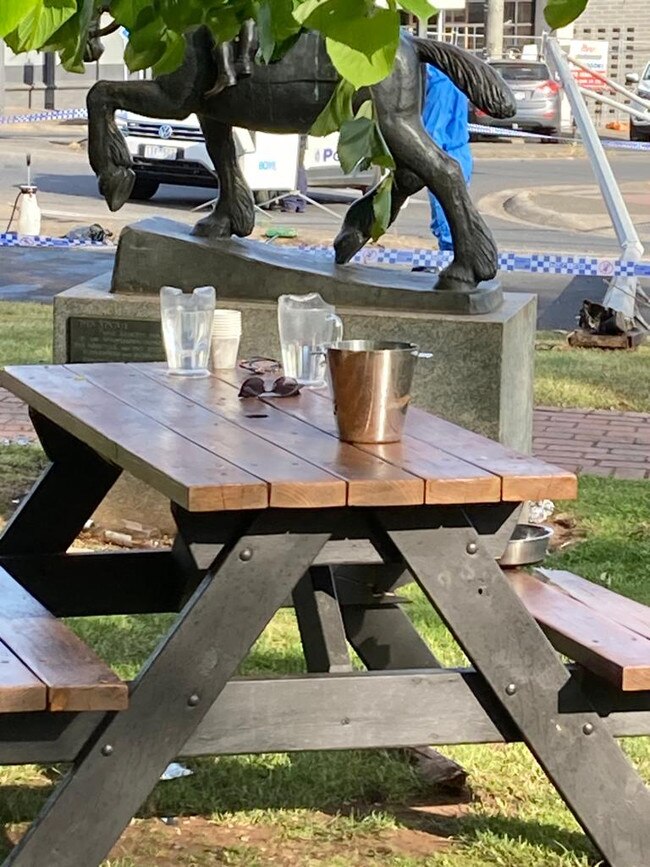 Sunglasses left on the bench where people were killed by the BMW. Picture: Damon Jonhston