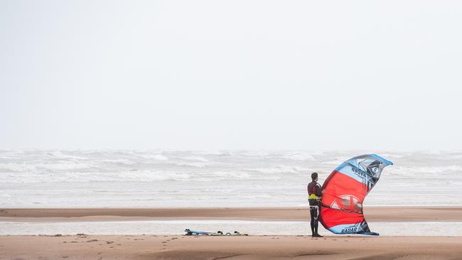 Kite Surfers and surfing at the Nightcliff Beach, Darwin. Picture: Pema Tamang Pakhrin