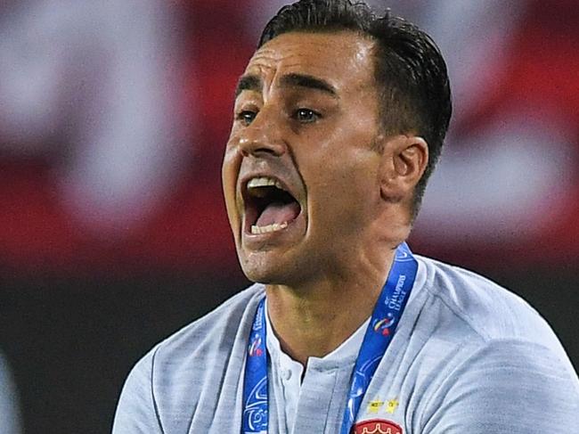 Guangzhou Evergrande's head coach Fabio Cannavaro gestures during the AFC Champions League group stage football match between China's Guangzhou Evergrande and Australia's Melbourne Victory in Guangzhou in China's southern Guangdong province on April 10, 2019. (Photo by STR / AFP) / China OUT