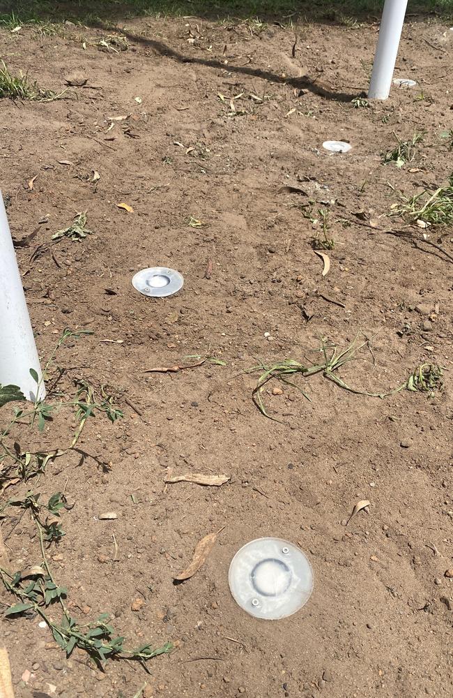 Ground lights installed at the base of the flagpoles site outside Yarra council's Clifton Hill works depot.