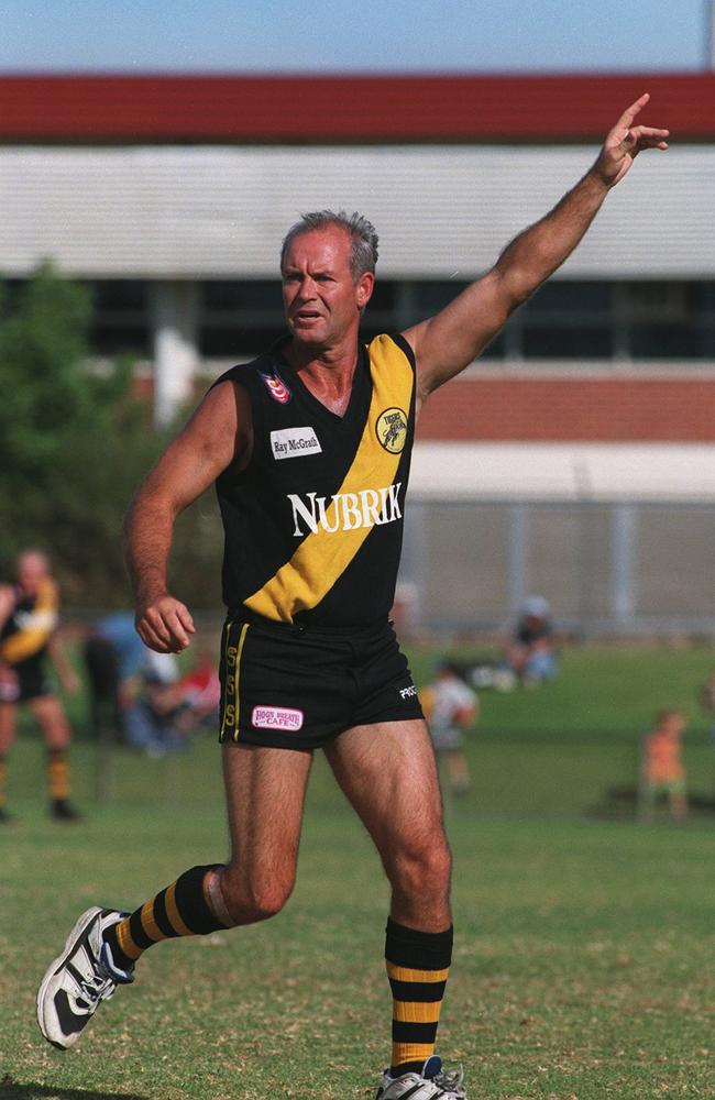 Actor Gary Sweet plays in the Glenelg Football Club Legends vs SuperRules league Allstars match at Glenelg Oval in 1999. Picture: Supplied