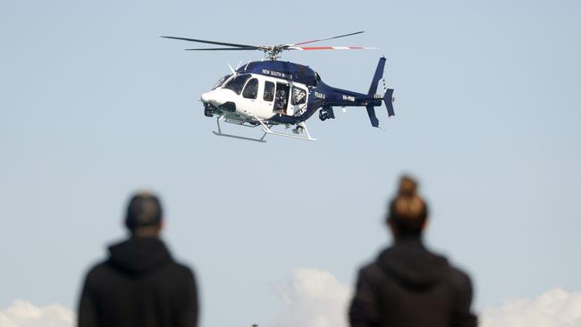 The police helicopter patrolling the Bondi to Bronte walk during lockdown. Picture: Sam Ruttyn