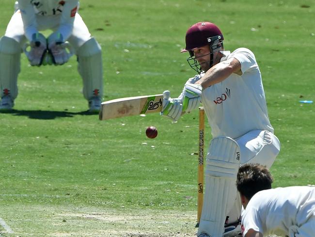 Peter Dickson goes for a cover drive. Picture: Andy Brownbill