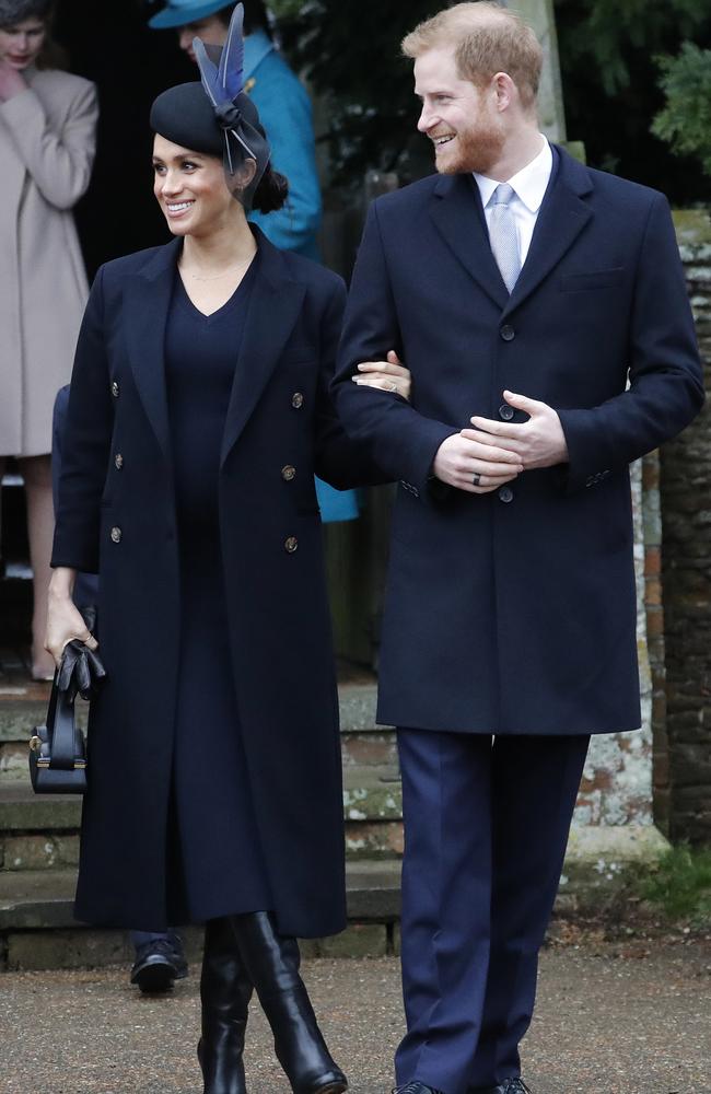 All smiles! Meghan and Harry are expecting their first baby in 2019. Picture: AP