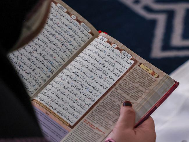 SELANGOR, MALAYSIA - MARCH 22: A Muslim woman reads the Quran at Sultan Salahuddin Abdul Aziz Mosque during the holy month of Ramadan on March 22, 2024, in Shah Alam, Selangor, Malaysia. During Ramadan, the ninth month of the Islamic calendar, Muslims worldwide observe a period of fasting, prayer, reflection, and community engagement, abstaining from food, drink, and other physical needs from dawn to dusk, while the Malaysian Ramadan experience is marked by vibrant cultural and religious traditions, including communal prayers, family iftar gatherings, and shared meals, fostering spiritual growth, self-discipline, and communal solidarity. (Photo by Annice Lyn/Getty Images)