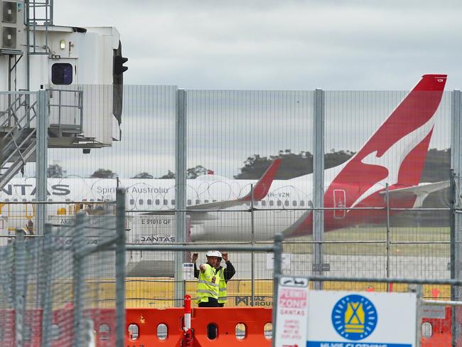 MELBOURNE AUSTRALIA - NewsWire Photos DECEMBER 13, 2024: Generic photo of Qantas terminal and Tullamarine Airport. Qantas engineers are targeting one of the busiest travel days of the year to stage another strike in their ongoing campaign for a 25 per cent pay rise.Picture: NewsWire / Luis Enrique Ascui