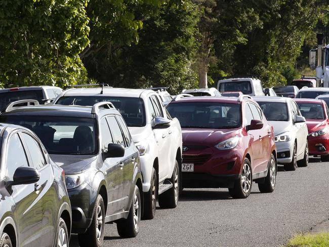 The school traffic around Rochedale State School is atrocious with cars backed up for kilometres, Wednesday, May 27, 2020. (AAP/Image Sarah Marshall)