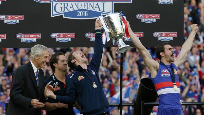 Bob Murphy &amp; Easton Wood hold the 2016 cup aloft. Picture :Wayne Ludbey