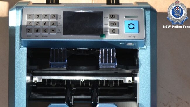 Police allegedly seized a money counting machine. Picture: NSW Police