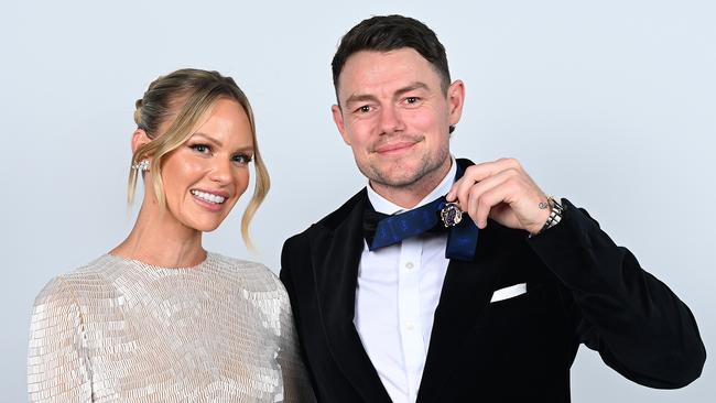 Lachie Neale and wife Julie after his win. Picture: Albert Perez/AFL Photos via Getty Images