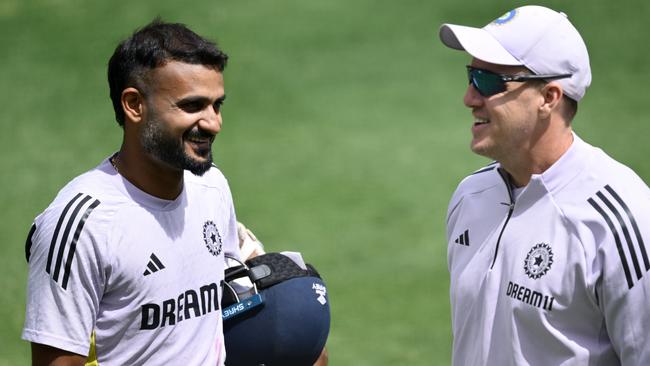 Indian fast bowler Akash Deep (left) says he and Rohit Sharma are fine after being struck in the MCG nets on Sunday. Picture: Quinn Rooney / Getty Images