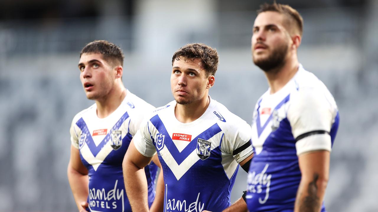 SYDNEY, AUSTRALIA - JULY 03: Jake Averillo (C) of the Bulldogs looks dejected after a try during the round 16 NRL match between the Canterbury Bulldogs and the Manly Sea Eagles at Stadium Australia, on July 03, 2021, in Sydney, Australia. (Photo by Mark Kolbe/Getty Images)