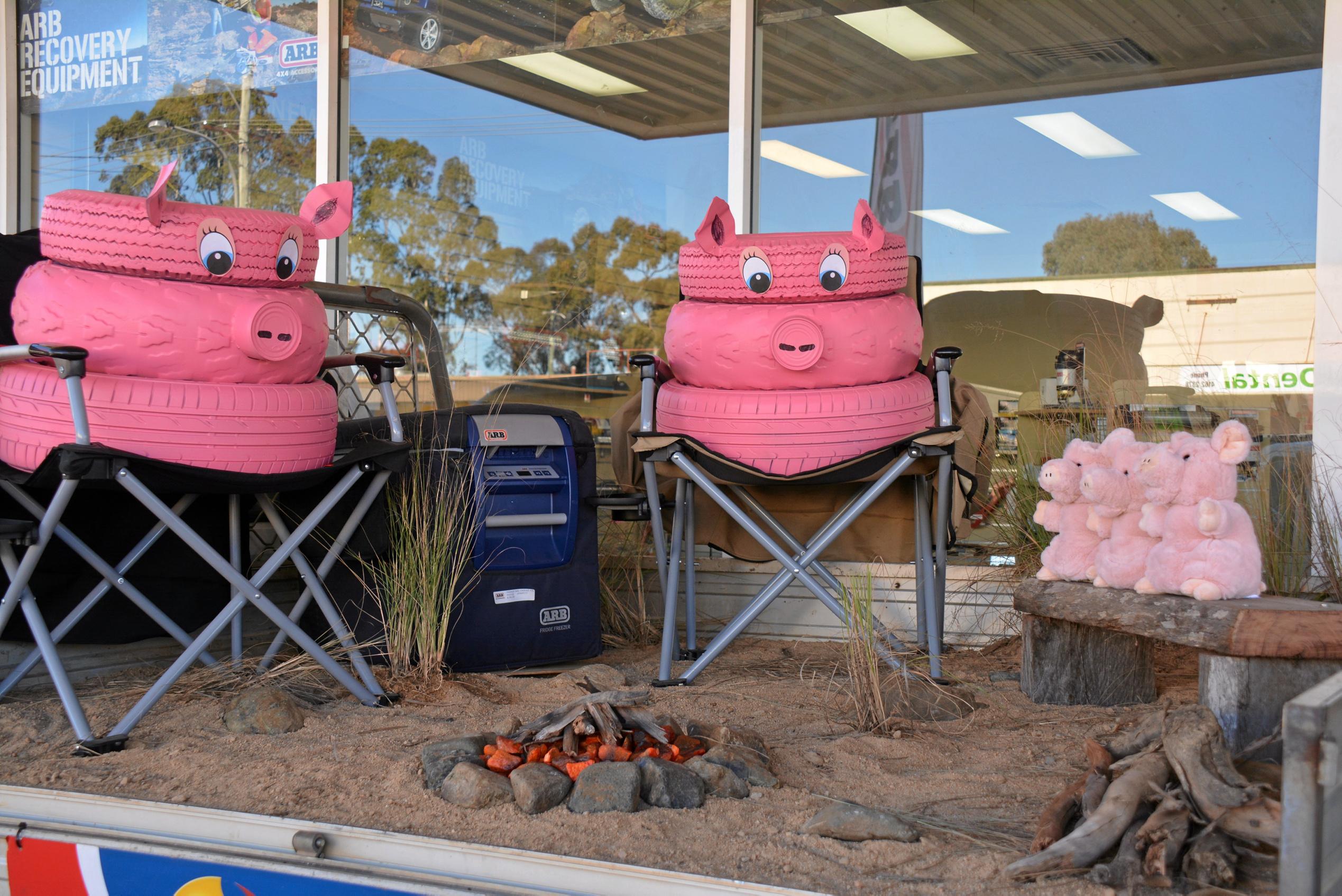 CAMPFIRE: Cooper Tires got all pink and piggy with their campfire display for BaconFest Street Window competition, earning them a highly commended. Picture: Jessica McGrath