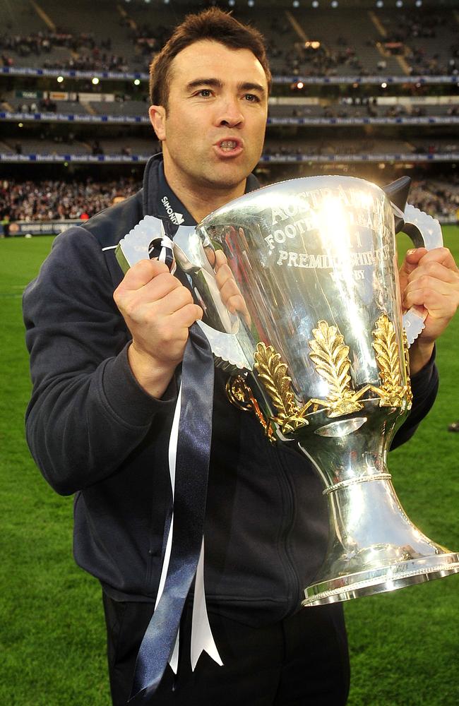 Chris Scott savours Geelong’s premiership win at the MCG in 2011.