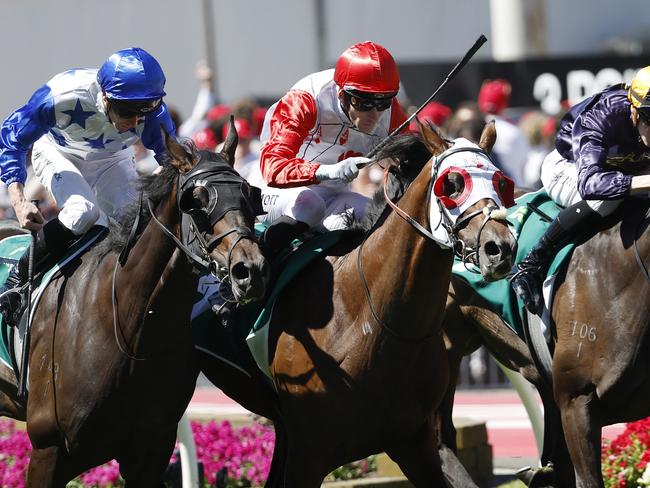 NCA. MELBOURNE, AUSTRALIA. October 26, 2024. Racing.  Cox Plate day at Moonee Valley racecourse.. Race 6. The Drummond Golf Vase.   Red Aces ridden by Jamie Mott (red cap) does enough to beat home Opening Address ridden by Ethan brown (rails) and King of Thunder ridden by James McDonald (outside)  .  Pictures : Michael Klein