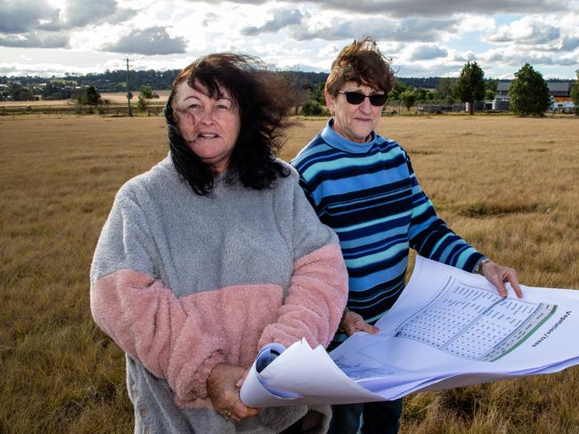 Karen Mansbridge and Desley Benecke on Ms Mansbridge's property which neighbours the location of Kingaroy Solar Farm set to begin construction in August 2022. Picture: Dominic Elsome