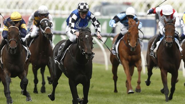 Mark Zahra and Gold Trip claim the 2022 Melbourne Cup with Deauville Legend (far right) hanging on for fourth place. Picture: Darrian Traynor/Getty Images