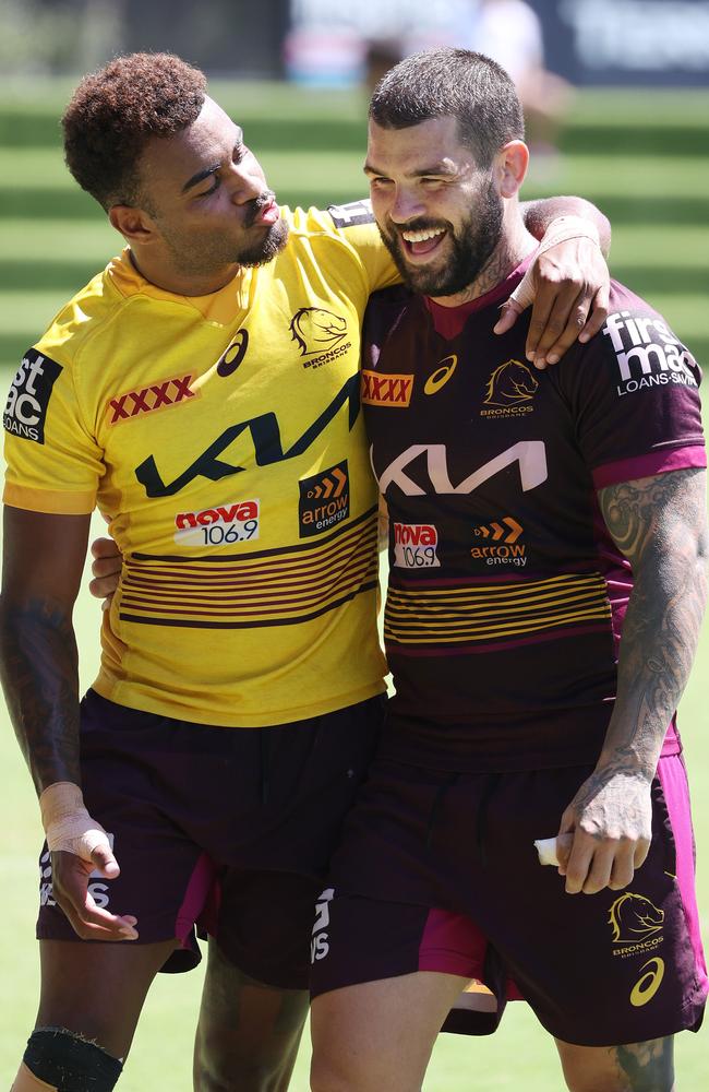 Ezra Mam showing some love for Adam Reynolds, Brisbane Broncos training, Red Hill. Picture: Liam Kidston