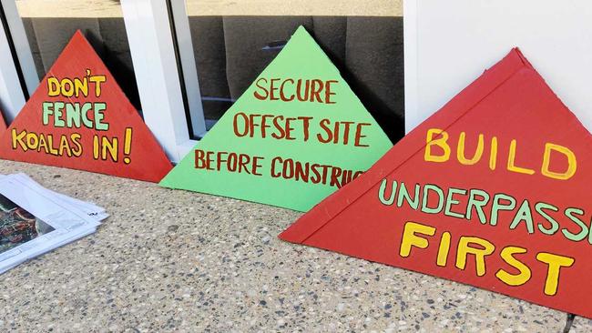 Koala activist signs outside the planning meeting yesterday. Picture: Rick Koenig