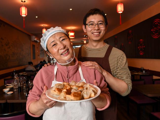 Panda and his Mum Zhenghua with their delicious dumplings. Picture: Penny Stephens