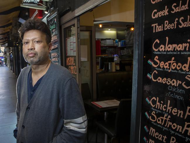 Case study for plan to ease restrictions that is tied to the vaccine roll-out, that experts say will help avoid another $170 billion economic hit. Cafe owner Johnny Sandish 0425 745 683 outside his cafe in Degraves st.Picture by Wayne Taylor 1st March 2021