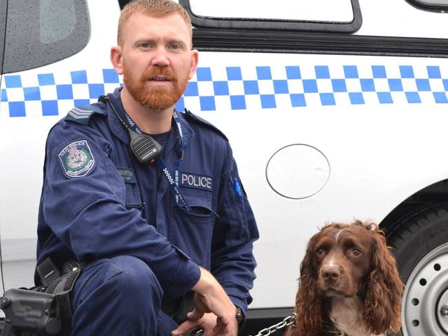 ‘A brilliant police officer’.... Senior Constable Luke Warburton and police dog T-Bone.