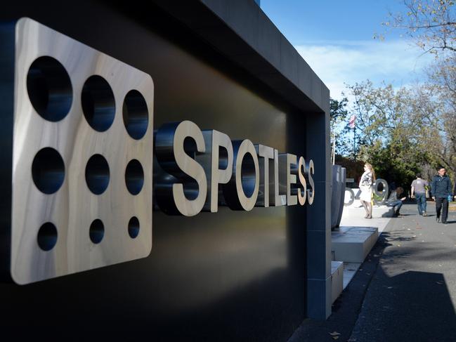 The Spotless Group Ltd. logo is displayed outside the company's headquarters in Melbourne, Australia, on Wednesday, May 21, 2014. Spotless, the cleaning and catering contractor owned by Pacific Equity Partners Ltd., sold shares in its initial public offering at the bottom end of a marketed range, said people with knowledge of the matter. Photographer: Carla Gottgens/Bloomberg