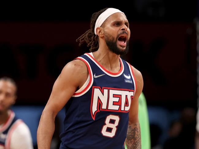 NEW YORK, NEW YORK - DECEMBER 03:  Patty Mills #8 of the Brooklyn Nets celebrates his shot late in the fourth quarter against the Minnesota Timberwolves at Barclays Center on December 03, 2021 in the Brooklyn borough of New York City. The Brooklyn Nets defeated the Minnesota Timberwolves 110-105. NOTE TO USER: User expressly acknowledges and agrees that, by downloading and or using this photograph, User is consenting to the terms and conditions of the Getty Images License Agreement. (Photo by Elsa/Getty Images)