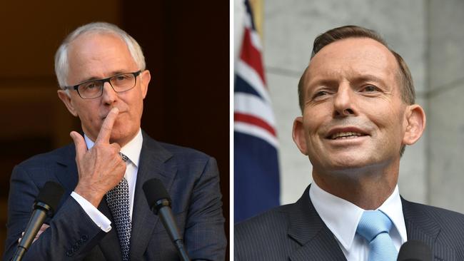 (FILES) A combo image of two file photographs shows current Australian Prime Minister Malcolm Turnbull (L) at a press conference in Canberra on September 20, 2015, and former prime minister Tony Abbott (R) speaking to the media in Canberra on February 9, 2015. Australian Prime Minister Malcolm Turnbull on March 22 March, 2016 slapped down his predeccessor Tony Abbott who dramatically intervened to claim credit for policies the government is taking to upcoming elections. Abbott, who was ousted last September in a party coup, announced the government was running on his record, in extraordinary comments reminiscent of the political anarchy that has produced five leaders in five years. / AFP PHOTO / PETER PARKS